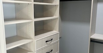 Closet with pull-out ironing board