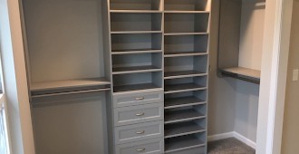 Master closet system in Cloud color with Allegra drawer fronts
